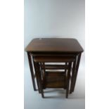 A Nest of Three Edwardian Mahogany Tables, the Longest 48.5cm Wide