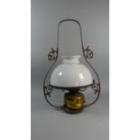 A Late 19th Century Oil Lamp with Brass Reservoir in Wrought Iron Ceiling Hanging Frame, 64cm High