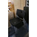 A Set of Four Modern Stacking Chairs