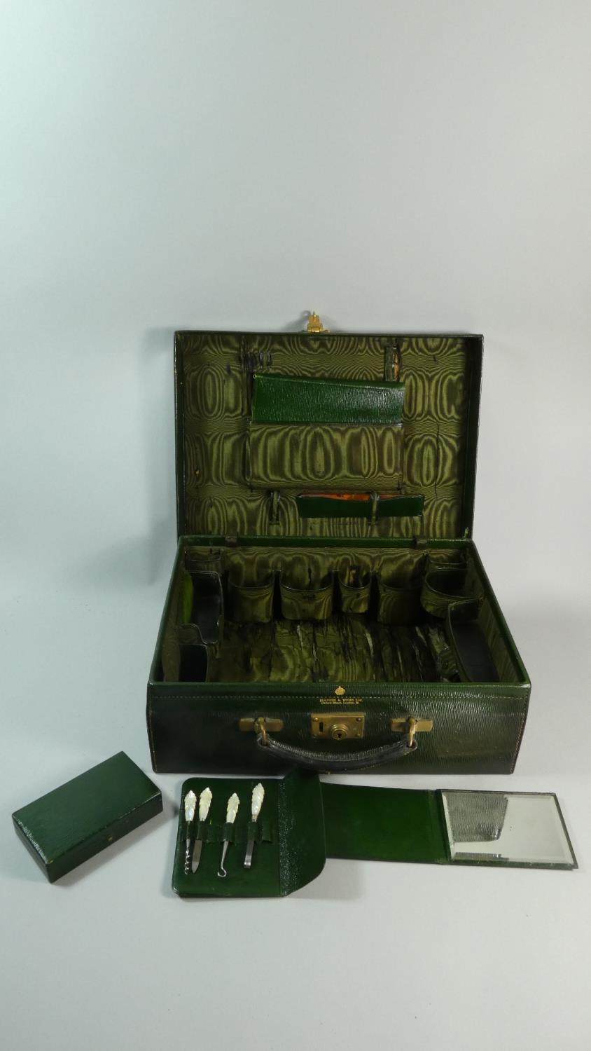 An Edwardian Mappin and Webb Travelling Case with Fitted Interior, Missing Glass and Silver Plate