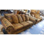 A Good Quality Four Piece Suite Comprising Two Large Three Seater Settees, Armchair and Foot Rest