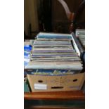A Box Containing 33rpm Records to Include Electric Light Orchestra, Vangelis, Bee Gees Status Quo,
