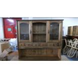 A Pine Dresser Cabinet with Six Spice Drawers, Two Glazed Sections and Central Open Display, 117cm