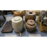 Three Glazed Stoneware Barrels and a Lidded Cooking Pot