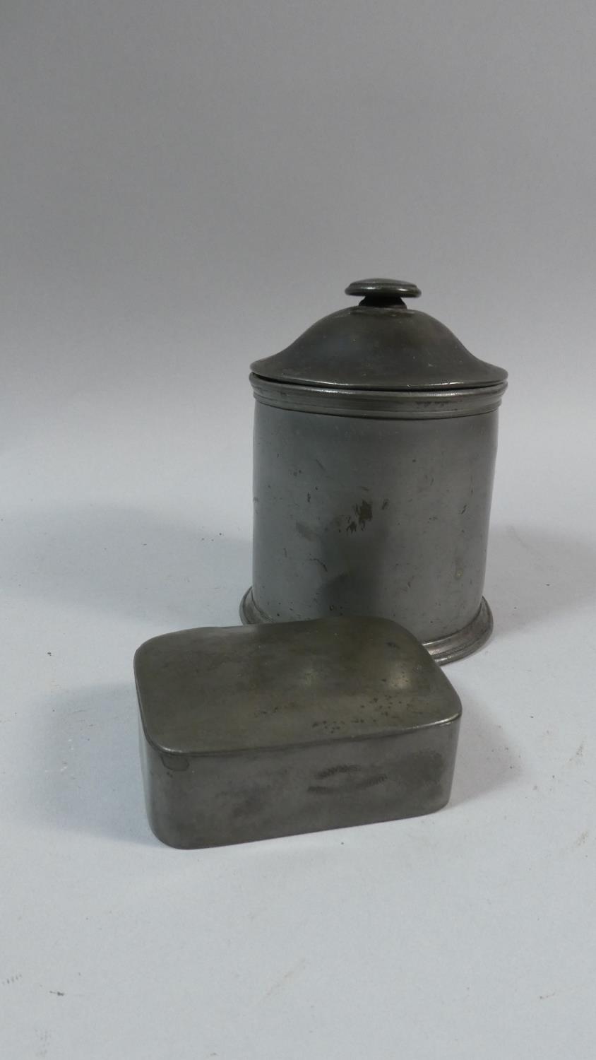 A 19th Century Cylindrical Pewter Tobacco Box with Inner Press Together with a Rectangular Pewter - Image 2 of 2