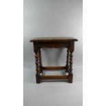 A Rectangular Oak Stool with Bobbin Supports, 47.5cm Wide