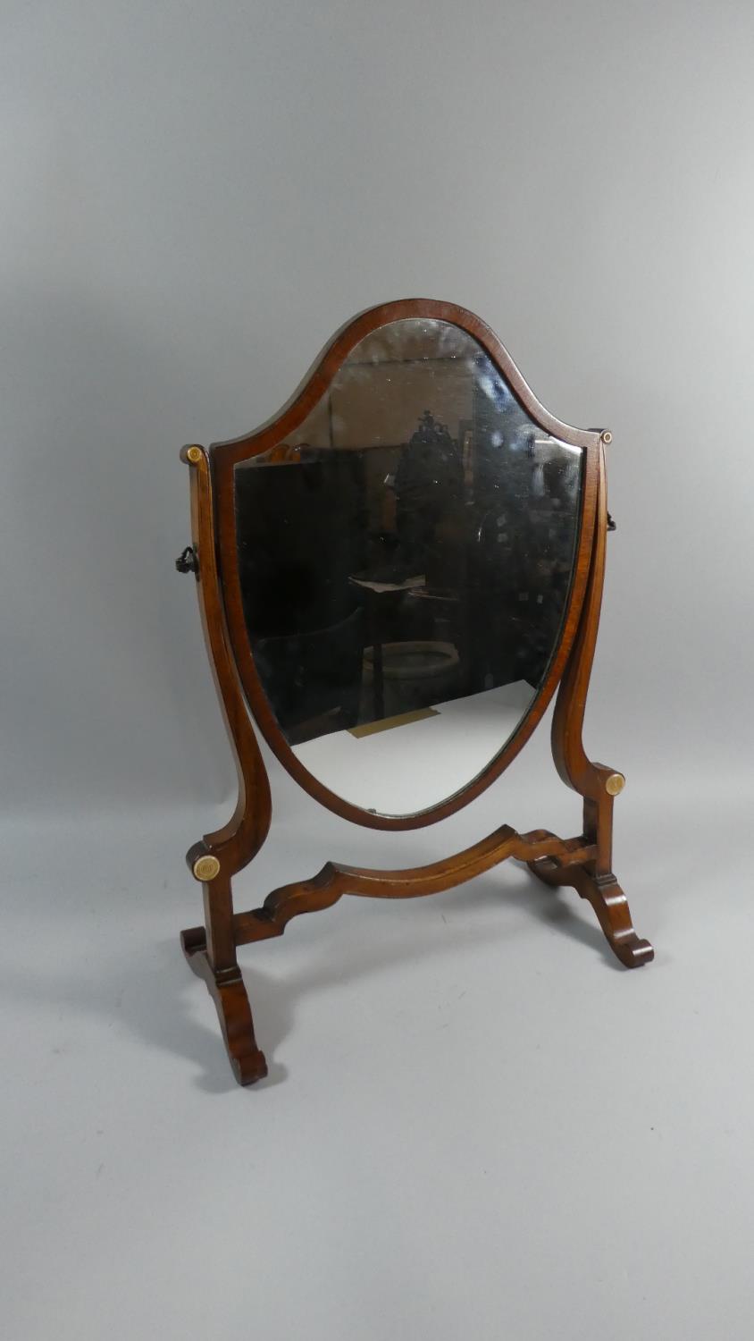 A 19th Century Shield Shaped Swing Dressing Table Mirror with Scrolled Feet, 52.5cm High