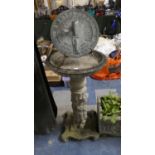 A Reconstituted Stone Birdbath on Reeded Column Support with Mouse and Snail Decoration Together