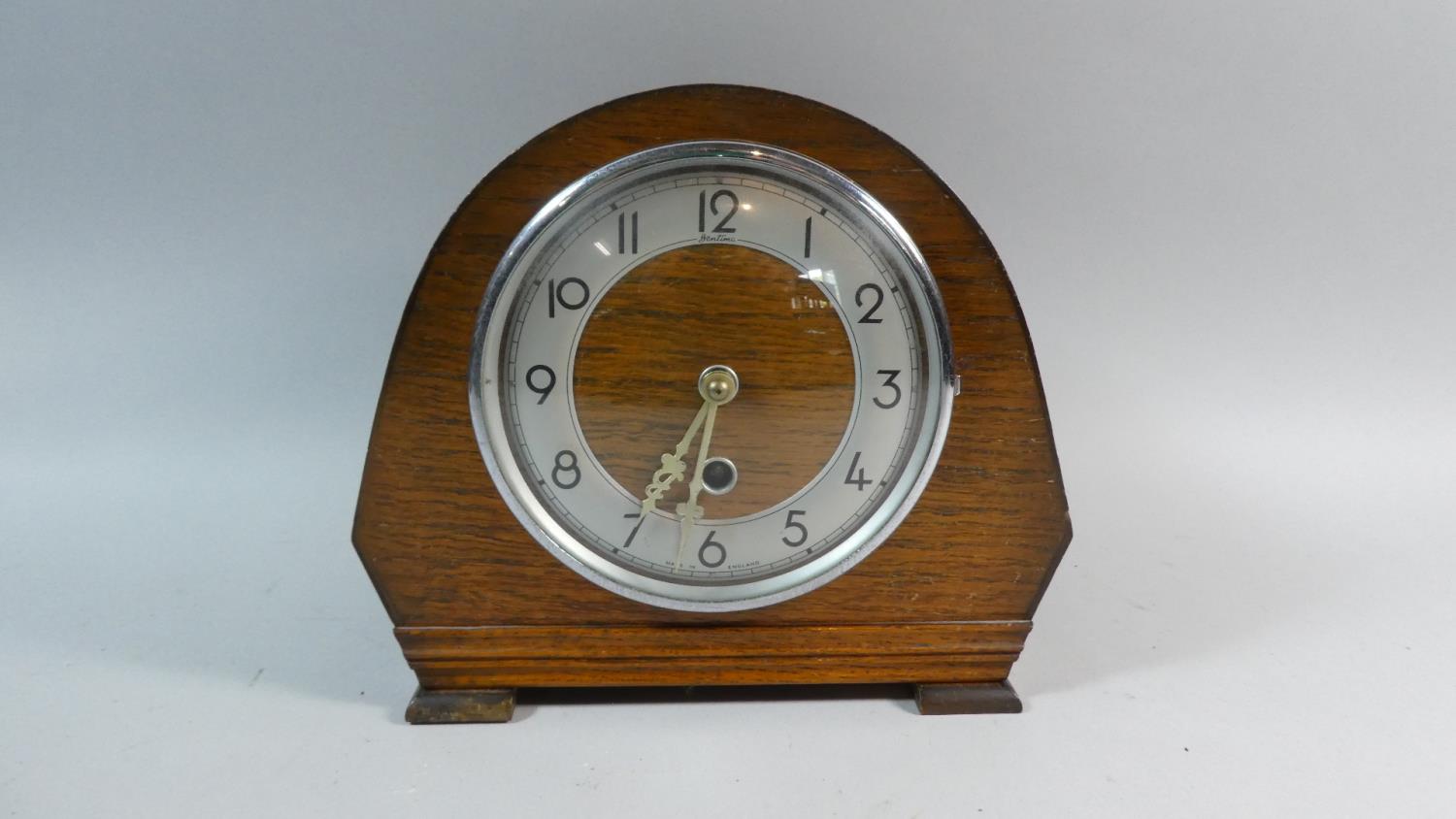 An Edwardian Oak Bentima Mantle Clock