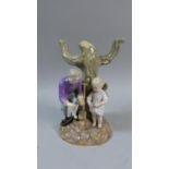 A Meissen Figure Group (Originally Two Branch Candelabra), Children with Bird's Eggs Under Tree.