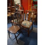 A Pair of Oak Framed Side Chairs and an Wheel Back Chair