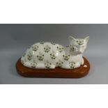 A Limited Edition Ceramic Study of a Reclining Cat, Harvey no.89/150 Signed P A Bootle On Wooden