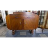 An Art Deco Side Board with Two Drawers and Side Cupboards, 138cm Wide