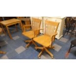 A Pair of Mid 20th Century Swivel Office Arm Chairs