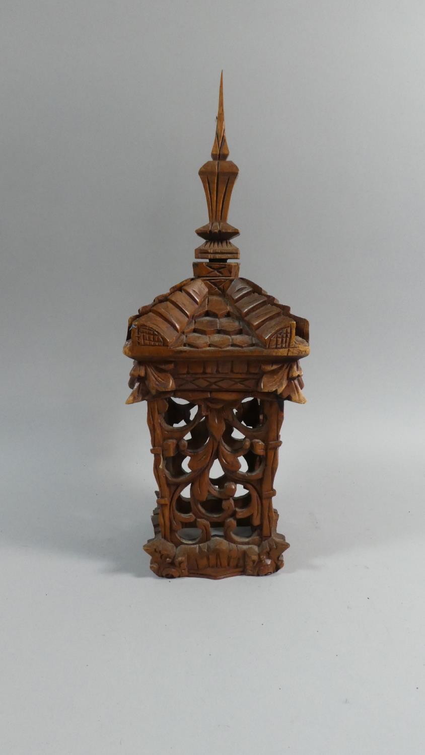 A Far Eastern Carved and Pierced Wooden Lantern Shade of Architectural Form, 37cm High