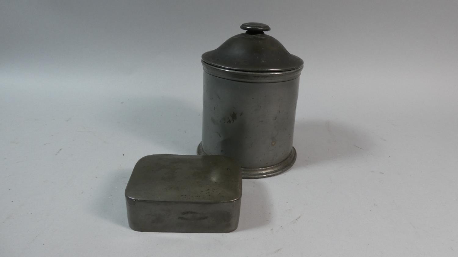 A 19th Century Cylindrical Pewter Tobacco Box with Inner Press Together with a Rectangular Pewter