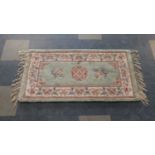 A Small Rectangular Chinese Hearth Rug, 120cm Long