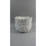 A Large White Glazed Jardiniere with Leaf Decoration in Relief, 29cm Diameter