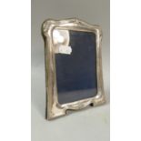 A Silver Mounted Easel Backed Photo Frame, 18cm high