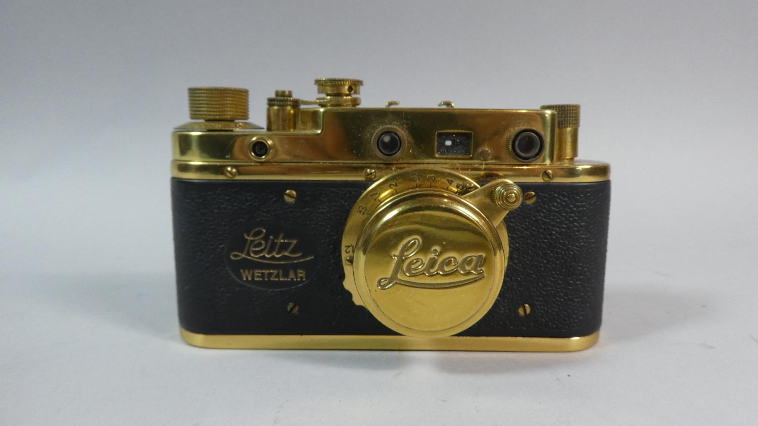 A Contemporary Brass Mounted Camera in the Leica style but formed from a FED 3 Camera body. (Not