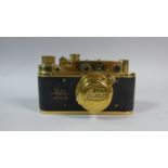 A Contemporary Brass Mounted Camera in the Leica style but formed from a FED 3 Camera body. (Not