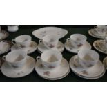 A Royal Doulton Tumbling Leaves Part Tea Set to Include Six Trios and a Cake Plate