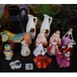 A Collection of Eight Royal Doulton Figures, Animal and Bird Ornaments, Jugs etc