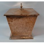 An Arts and Crafts Hammered Copper Coal Bucket of Waisted Form with Lid, One Ring Handle Missing,