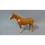 A Beswick Thoroughbred Stallion (Large) Model no.1772A, Palomino