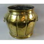 A Late 19th Century/Early 20th Century Brass Coal Bucket with Ribbed Body and Lion Mask Ring