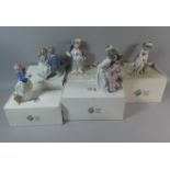 A Collection of Five Boxed Nao Figural Ornaments