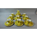 A Early 20th Century Hand Painted Part Tea Set on Yellow Ground Decorated with Oriental Fans,