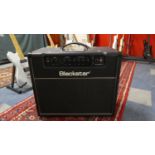 A Blackstar HT Studio 20 Electric Guitar Amplifier with Owners Manual