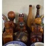 A Collection of Eleven Covered Decanters, Various Decoration