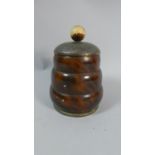 A Novelty Faux Tortoise Shell Cigarette Dispenser with Pull Up Lid, 14cm High