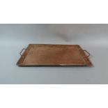 A Rectangular Hand Beaten Copper Two Handled Tray Stamped JP for John Pearson, 49cm Wide