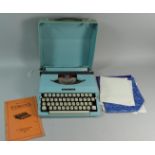 A Vintage Corona Portable Typewriter Complete with Instruction Booklet