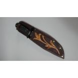 A Modern Hunting Knife with Leather Scabbard