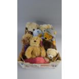 A Box Containing Soft Toys and Teddy Bear