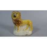 An Early Staffordshire Study of a Lion, 8cm high