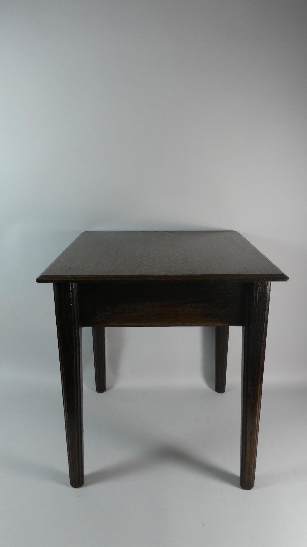 A George III Oak Low Table with a Plank Top Supported on Moulded Tapering Legs, 46x46x51cms