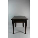 A George III Oak Low Table with a Plank Top Supported on Moulded Tapering Legs, 46x46x51cms