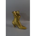 A Heavy Brass Model of a Ladies Victorian Boot, 23cm High