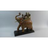 An Indian Large Enamelled Bronze Study of Elephant, Mahout and Two Seated Dignitaries set on