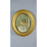 A 19th Century Silk Embroidered Oval Miniature of Girl Seated under Tree 'Worked by Mary Teresa