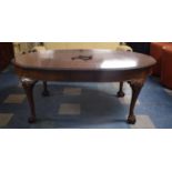 A Late Victorian Mahogany Oval Wind Out Dining Table with One Extra Leaf