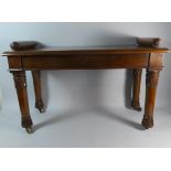 A 19th Century Mahogany Hall Bench/Window Seat with Turned Bolster Ends on a Solid Seat supported on