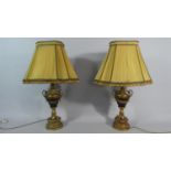 A Pair of Large French Urn Shaped Two Handled Lamps with Ormolu Mounts and Swags. Complete with