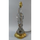 A Gilt Metal and Glass Figural Table Lamp in the Form of a Robed Elder. 38cms High