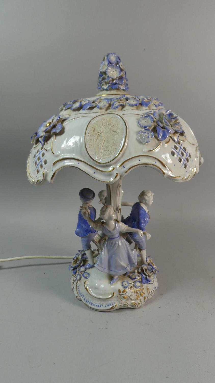 A Late 20th Century East German Porcelain Table Lamp in the Form of Children Playing Ring a Ring - Image 4 of 9